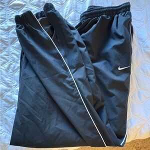 Nike mesh-lined ankle-zip tracksuit pants